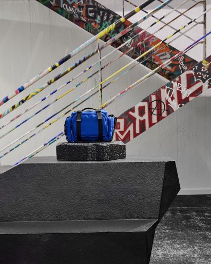 Graffitied stairs in rainwear store in Aarhus, Denmark
