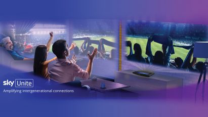 Advertisement poster showing a man and a woman watching a sports game