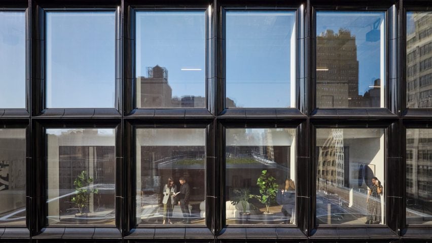Black terracotta clad office building