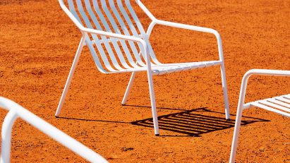 White seating on orange earth in outback
