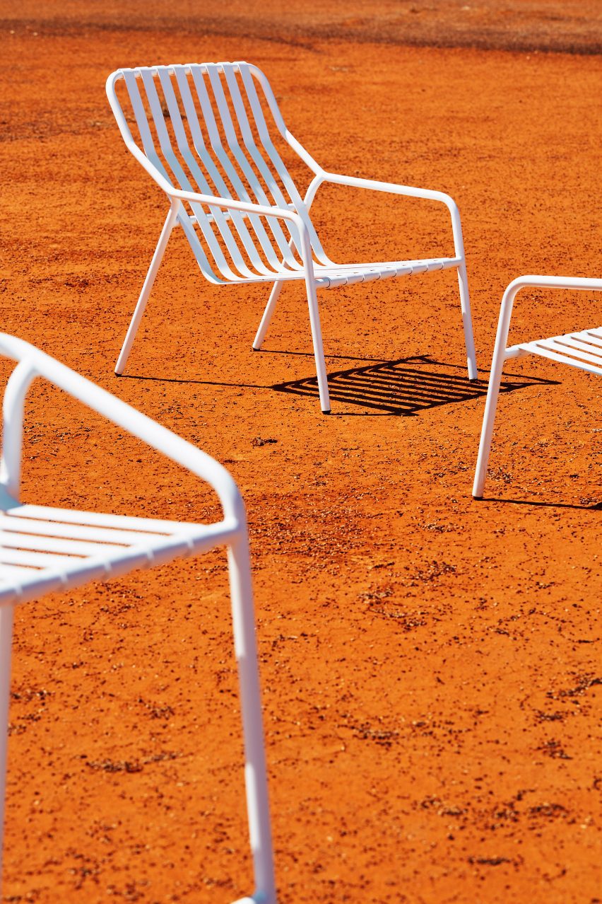 White seating on orange earth in outback