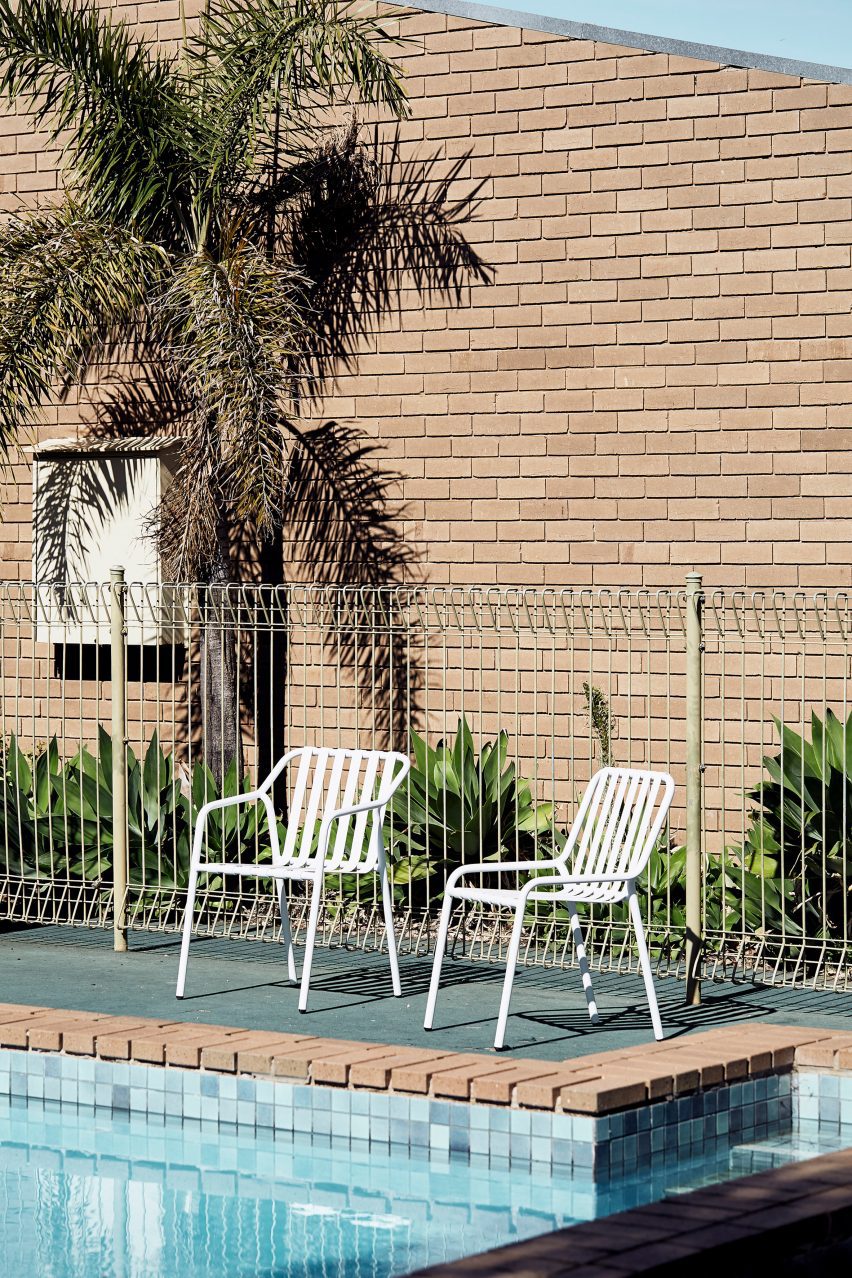 White chairs by pool
