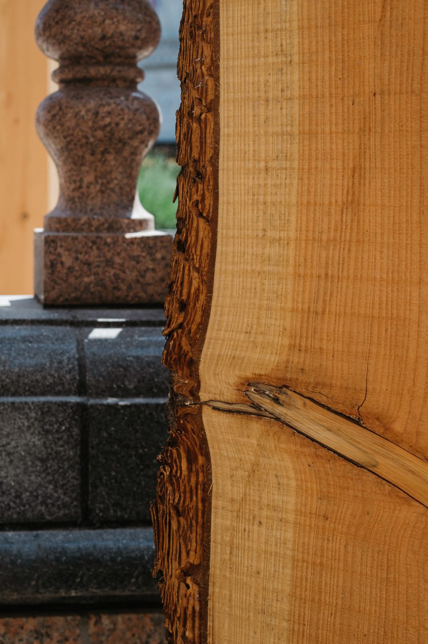 Close-up shot of contrast between rough bark and smooth wood Studio Bark installation