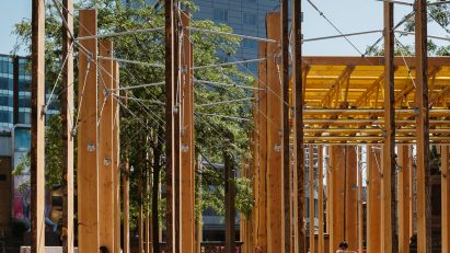 Studio Bark wooden installation with steel rods