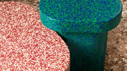 Terrazzo-style tables on terrazzo floor