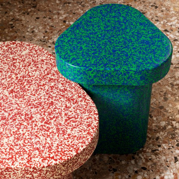 Terrazzo-style tables on terrazzo floor