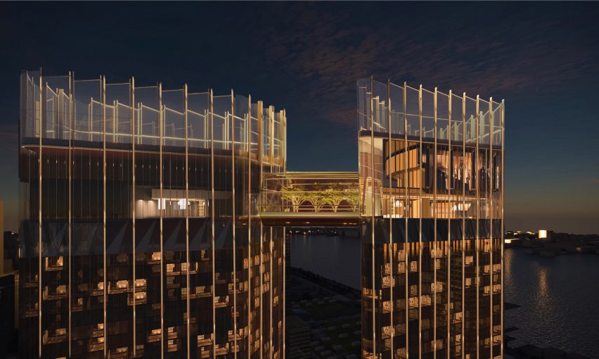 The top of two towers connected with a covered walkway