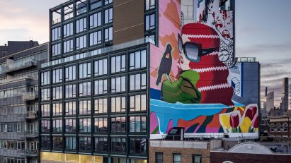 Photograph of a mural and terracotta facade