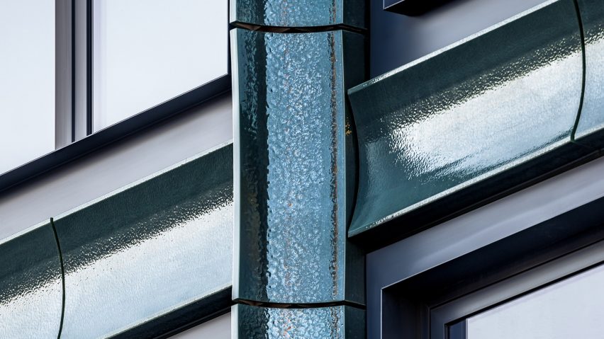 Close up of British racing green terracotta tiles