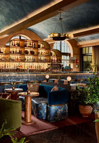 Lobby bar with vaulted ceilings and eclectic furniture