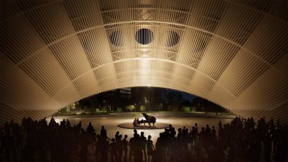 Pianist playing in arch in Houston
