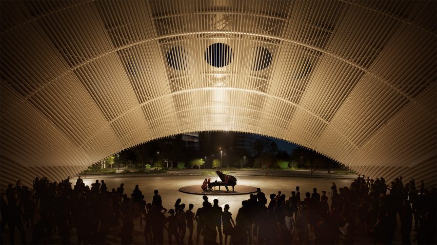 Pianist playing in arch in Houston