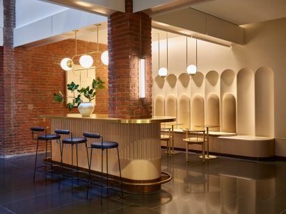 Counter area with bench and cafe seating behind