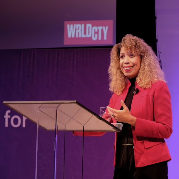 Photo of a person speaking at the WRLDCTY forum