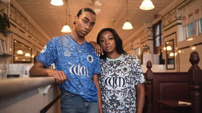 Models wearing football kit informed by Morris & Co design