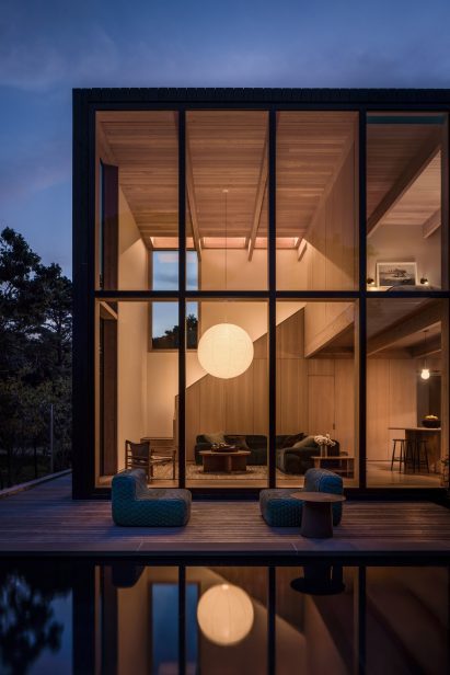 Beach house living room with a paper lamp