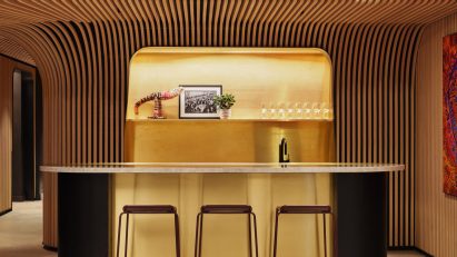 Woods Bagot lines American Australian Association HQ with oak battens