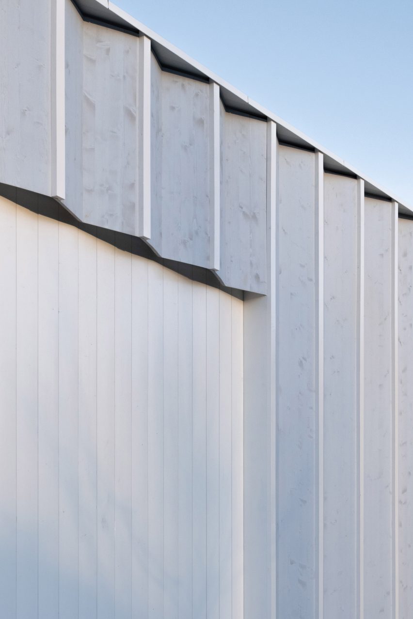 External blue timber pleated facade