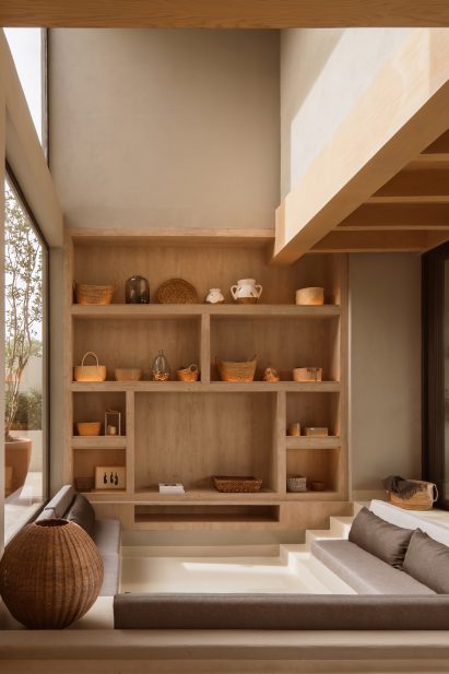 Sunken living space with neutral hued interiors
