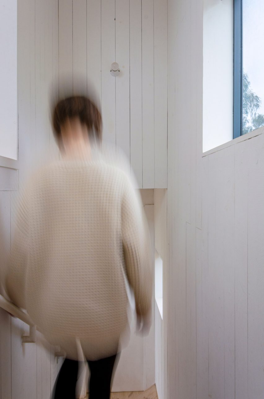 A woman descending a staircase