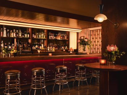Bar with mahogany top and burgundy lacquered front