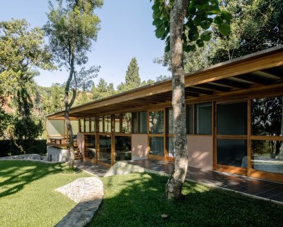 Facade of timber-clad home by Denis Joelsons
