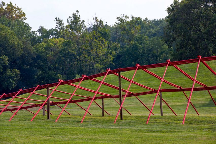 A structure of red coated bamboo poles