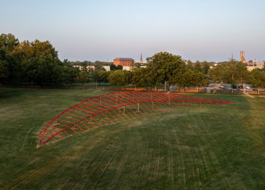 A structure of red coated bamboo poles