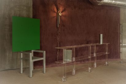 Chair and transluscent shelf in Forma gallery