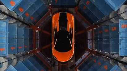 Car being elevated through Future Car Park by Daniel Statham Studio