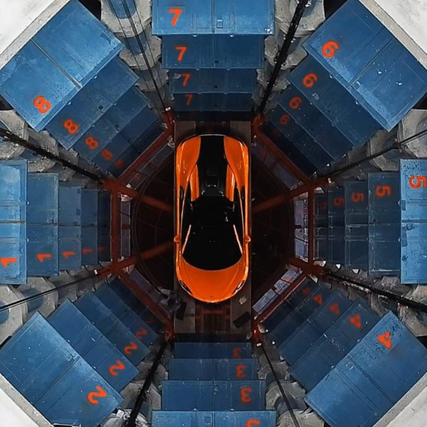 Car being elevated through Future Car Park by Daniel Statham Studio