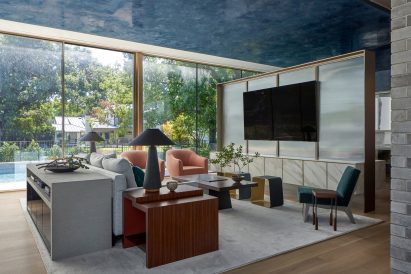 Floor-to-ceiling glazing and geometric furniture
