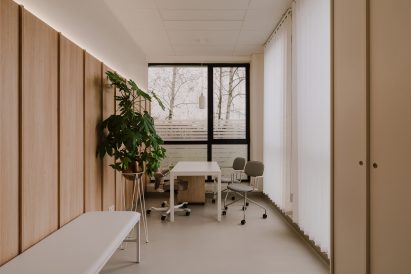 Treatment room with wood panelled walls