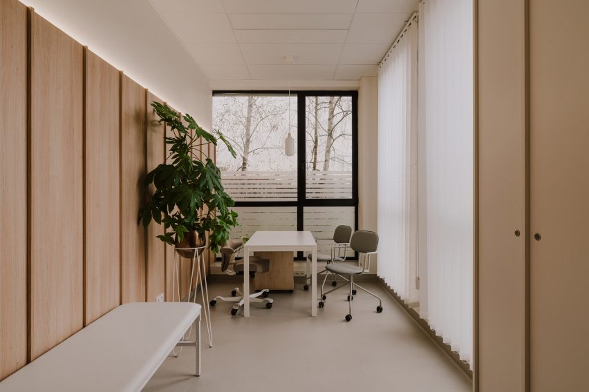 Treatment room with wood panelled walls