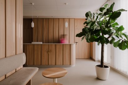 Waiting room with wood panelled walls