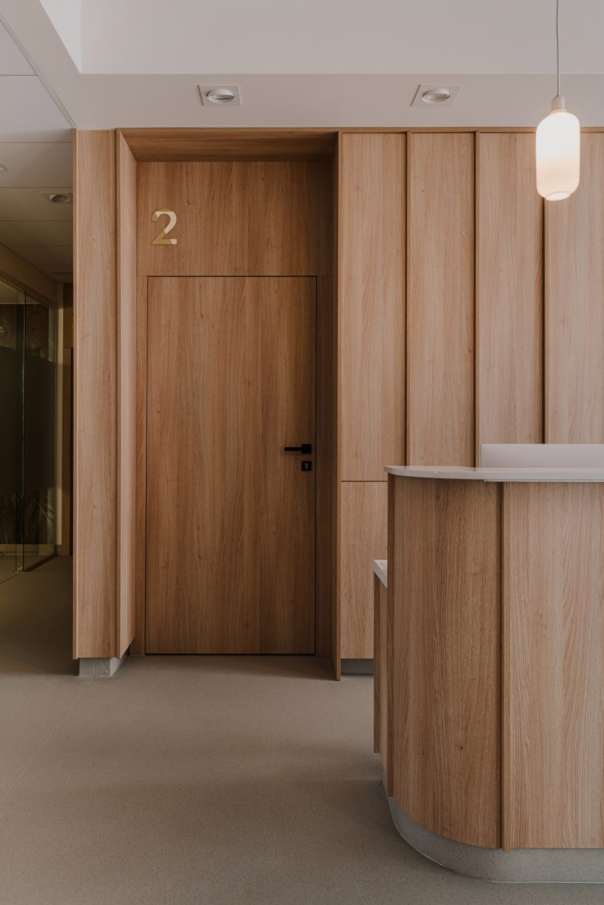 Waiting room with wood panelled walls