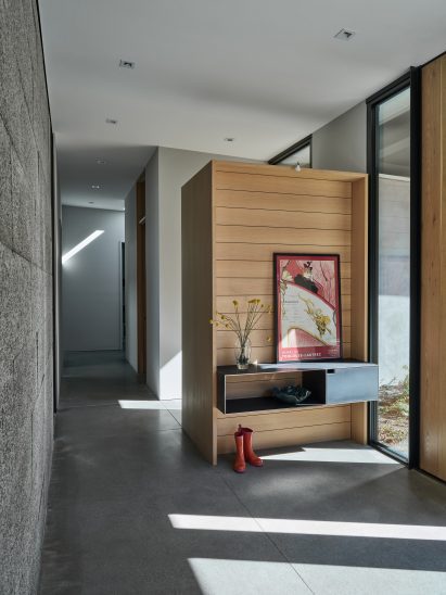 Concrete walls and white shelf