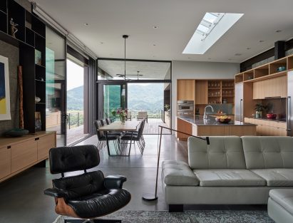 Modern kitchen with mountains in the background