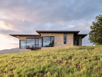 Photo of residence with clouds in background