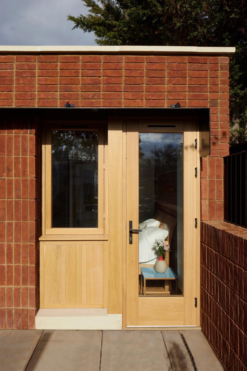 Close up of oak door and brickwork