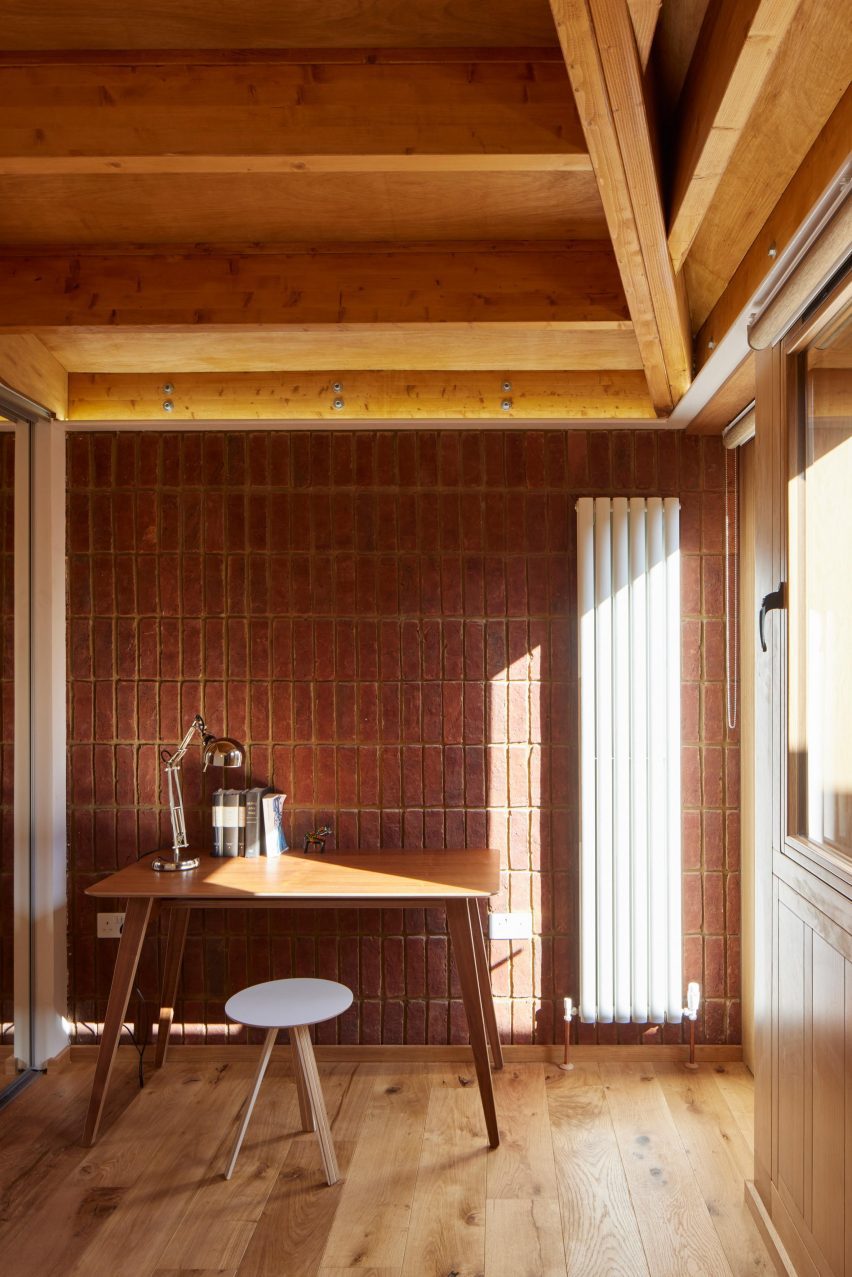 Room illuminated by sunlight through large windows