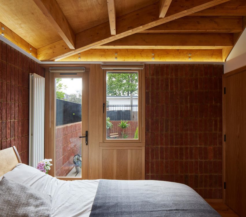 Oak door leading into a courtyard from the bedroom