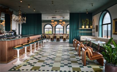 Spacious bar area with teal accents