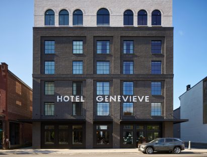 Exterior view of black-brick building