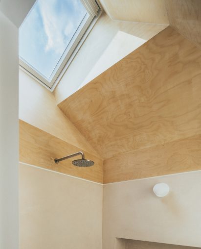 Timber-clad light well in Huron House