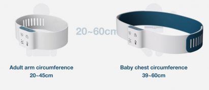 Two vital monitoring devices sized to fit an adult arm and a baby's chest