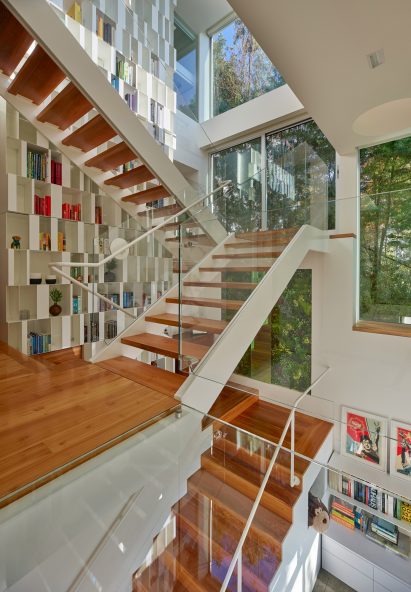 Large central staircase with teak treads