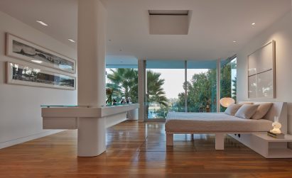 Bedroom with sliding glass walls