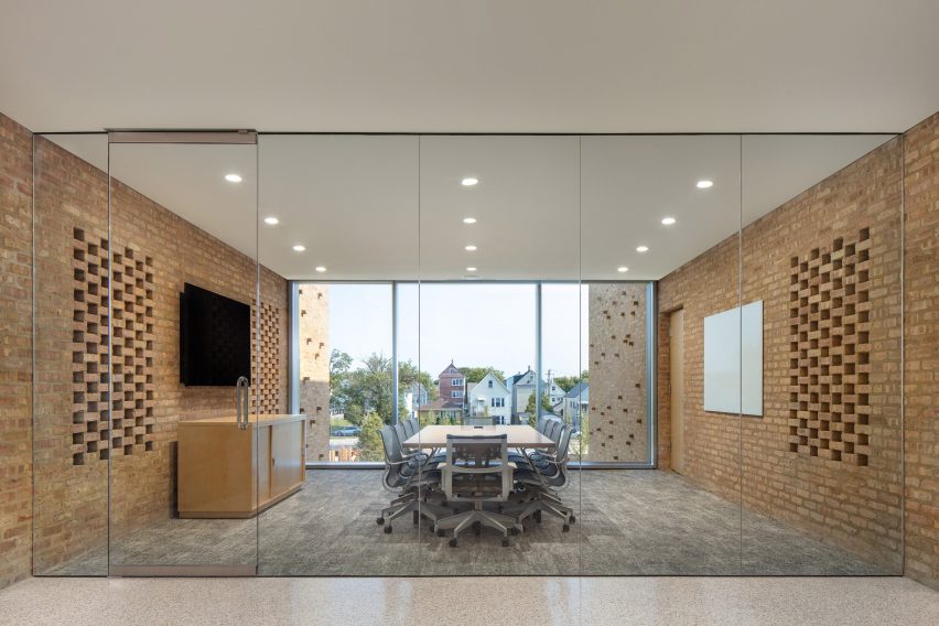 Office meeting space with exposed brick walls