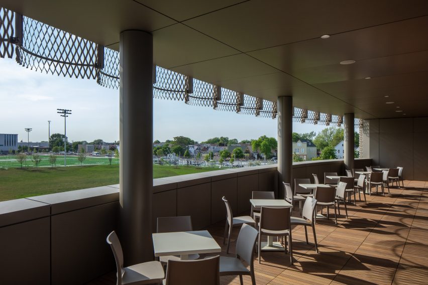 Terrace with seating overlooking a park